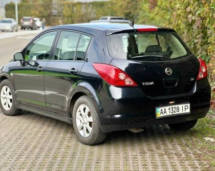 Черный Ниссан Тиида, объемом двигателя 1.6 л и пробегом 117 тыс. км за 7400 $, фото 5 на Automoto.ua