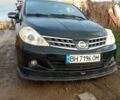 Черный Ниссан Тиида, объемом двигателя 1.5 л и пробегом 120 тыс. км за 6000 $, фото 1 на Automoto.ua