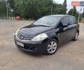 Черный Ниссан Тиида, объемом двигателя 1.6 л и пробегом 192 тыс. км за 6800 $, фото 7 на Automoto.ua