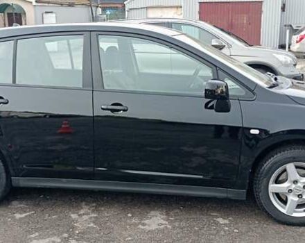 Черный Ниссан Тиида, объемом двигателя 1.6 л и пробегом 300 тыс. км за 4550 $, фото 5 на Automoto.ua