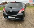 Черный Ниссан Тиида, объемом двигателя 1.5 л и пробегом 145 тыс. км за 6000 $, фото 1 на Automoto.ua