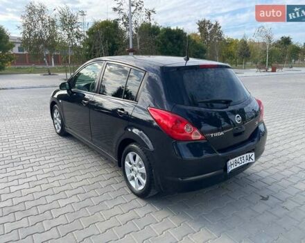 Черный Ниссан Тиида, объемом двигателя 1.6 л и пробегом 229 тыс. км за 6800 $, фото 3 на Automoto.ua