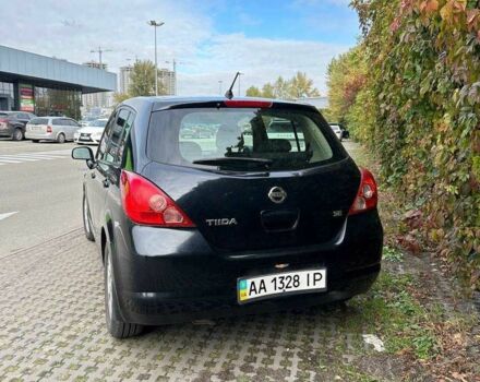 Черный Ниссан Тиида, объемом двигателя 1.6 л и пробегом 117 тыс. км за 7400 $, фото 4 на Automoto.ua
