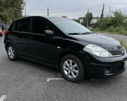 Черный Ниссан Тиида, объемом двигателя 1.6 л и пробегом 190 тыс. км за 6500 $, фото 1 на Automoto.ua