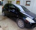 Чорний Ніссан Тііда, об'ємом двигуна 1.6 л та пробігом 203 тис. км за 5300 $, фото 1 на Automoto.ua
