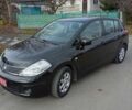 Черный Ниссан Тиида, объемом двигателя 1.6 л и пробегом 240 тыс. км за 7900 $, фото 1 на Automoto.ua