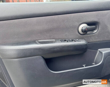 Черный Ниссан Тиида, объемом двигателя 1.6 л и пробегом 186 тыс. км за 6999 $, фото 6 на Automoto.ua