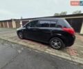 Черный Ниссан Тиида, объемом двигателя 1.6 л и пробегом 190 тыс. км за 4999 $, фото 1 на Automoto.ua