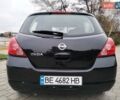 Черный Ниссан Тиида, объемом двигателя 1.6 л и пробегом 114 тыс. км за 6900 $, фото 7 на Automoto.ua