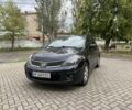 Чорний Ніссан Тііда, об'ємом двигуна 1.6 л та пробігом 179 тис. км за 5700 $, фото 1 на Automoto.ua