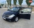 Чорний Ніссан Тііда, об'ємом двигуна 1.6 л та пробігом 229 тис. км за 6550 $, фото 5 на Automoto.ua