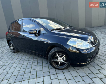 Черный Ниссан Тиида, объемом двигателя 1.6 л и пробегом 169 тыс. км за 6200 $, фото 1 на Automoto.ua