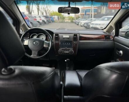 Черный Ниссан Тиида, объемом двигателя 1.49 л и пробегом 152 тыс. км за 8000 $, фото 22 на Automoto.ua