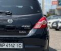 Черный Ниссан Тиида, объемом двигателя 1.49 л и пробегом 152 тыс. км за 8000 $, фото 4 на Automoto.ua