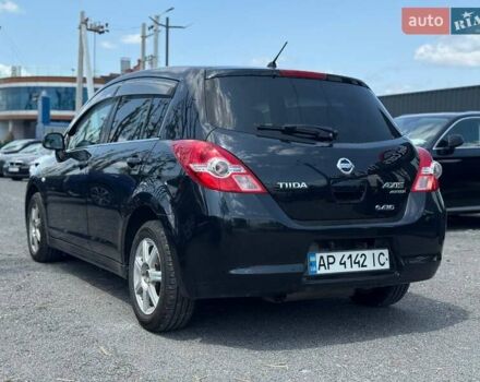 Черный Ниссан Тиида, объемом двигателя 1.49 л и пробегом 152 тыс. км за 8000 $, фото 2 на Automoto.ua