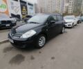 Черный Ниссан Тиида, объемом двигателя 1.5 л и пробегом 51 тыс. км за 7300 $, фото 1 на Automoto.ua