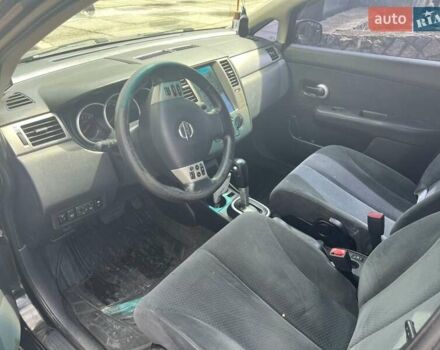 Черный Ниссан Тиида, объемом двигателя 1.6 л и пробегом 237 тыс. км за 6199 $, фото 1 на Automoto.ua