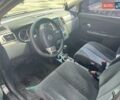 Черный Ниссан Тиида, объемом двигателя 1.6 л и пробегом 237 тыс. км за 6199 $, фото 1 на Automoto.ua
