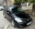 Черный Ниссан Тиида, объемом двигателя 1.6 л и пробегом 155 тыс. км за 5400 $, фото 1 на Automoto.ua