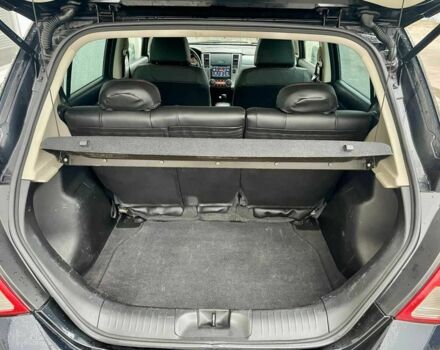 Черный Ниссан Тиида, объемом двигателя 1.5 л и пробегом 102 тыс. км за 7400 $, фото 13 на Automoto.ua