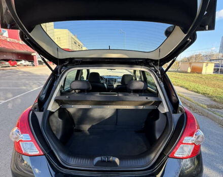 Черный Ниссан Тиида, объемом двигателя 1.5 л и пробегом 30 тыс. км за 7800 $, фото 12 на Automoto.ua