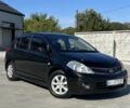 Черный Ниссан Тиида, объемом двигателя 1.6 л и пробегом 181 тыс. км за 7028 $, фото 1 на Automoto.ua