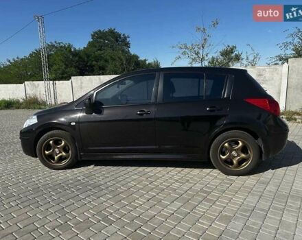 Черный Ниссан Тиида, объемом двигателя 1.6 л и пробегом 141 тыс. км за 8000 $, фото 2 на Automoto.ua