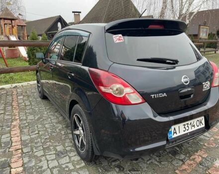 Черный Ниссан Тиида, объемом двигателя 1.5 л и пробегом 102 тыс. км за 7400 $, фото 3 на Automoto.ua