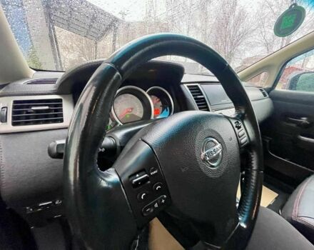 Черный Ниссан Тиида, объемом двигателя 1.5 л и пробегом 102 тыс. км за 7400 $, фото 9 на Automoto.ua