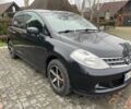 Черный Ниссан Тиида, объемом двигателя 1.5 л и пробегом 102 тыс. км за 7400 $, фото 1 на Automoto.ua