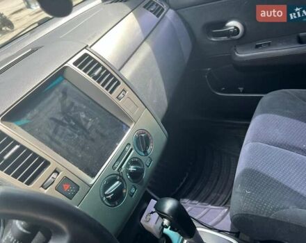 Черный Ниссан Тиида, объемом двигателя 1.6 л и пробегом 237 тыс. км за 6199 $, фото 7 на Automoto.ua