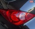 Черный Ниссан Тиида, объемом двигателя 1.6 л и пробегом 141 тыс. км за 8000 $, фото 6 на Automoto.ua