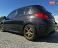 Черный Ниссан Тиида, объемом двигателя 1.6 л и пробегом 141 тыс. км за 8000 $, фото 3 на Automoto.ua