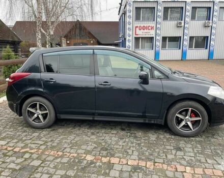 Черный Ниссан Тиида, объемом двигателя 1.5 л и пробегом 102 тыс. км за 7400 $, фото 1 на Automoto.ua