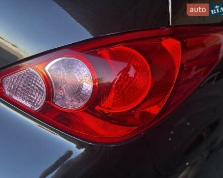 Черный Ниссан Тиида, объемом двигателя 1.6 л и пробегом 141 тыс. км за 8000 $, фото 7 на Automoto.ua