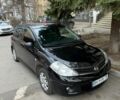Черный Ниссан Тиида, объемом двигателя 1.6 л и пробегом 155 тыс. км за 5400 $, фото 1 на Automoto.ua