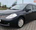 Черный Ниссан Тиида, объемом двигателя 1.5 л и пробегом 120 тыс. км за 7000 $, фото 1 на Automoto.ua