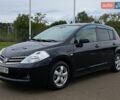 Черный Ниссан Тиида, объемом двигателя 1.5 л и пробегом 129 тыс. км за 6600 $, фото 1 на Automoto.ua