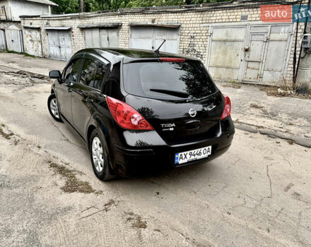 Черный Ниссан Тиида, объемом двигателя 1.6 л и пробегом 95 тыс. км за 10200 $, фото 4 на Automoto.ua
