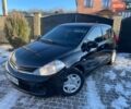 Черный Ниссан Тиида, объемом двигателя 1.6 л и пробегом 122 тыс. км за 8000 $, фото 1 на Automoto.ua