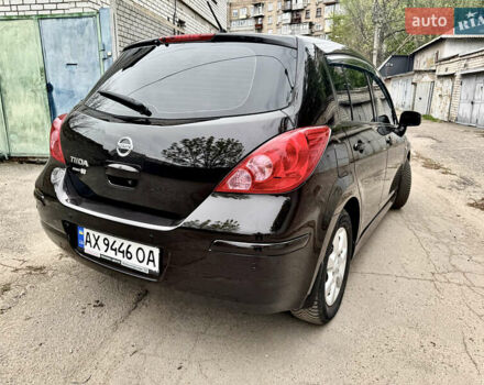 Черный Ниссан Тиида, объемом двигателя 1.6 л и пробегом 95 тыс. км за 10200 $, фото 3 на Automoto.ua