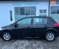 Черный Ниссан Тиида, объемом двигателя 1.6 л и пробегом 200 тыс. км за 8200 $, фото 1 на Automoto.ua