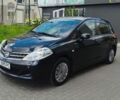 Черный Ниссан Тиида, объемом двигателя 1.5 л и пробегом 67 тыс. км за 7700 $, фото 1 на Automoto.ua