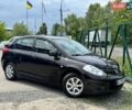 Черный Ниссан Тиида, объемом двигателя 1.6 л и пробегом 166 тыс. км за 7200 $, фото 1 на Automoto.ua
