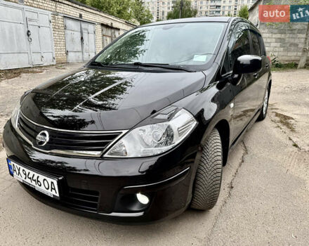 Черный Ниссан Тиида, объемом двигателя 1.6 л и пробегом 95 тыс. км за 10200 $, фото 1 на Automoto.ua