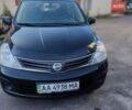 Черный Ниссан Тиида, объемом двигателя 1.6 л и пробегом 217 тыс. км за 5500 $, фото 1 на Automoto.ua
