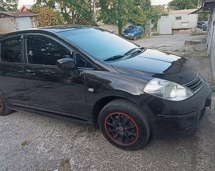 Черный Ниссан Тиида, объемом двигателя 1.6 л и пробегом 190 тыс. км за 6200 $, фото 11 на Automoto.ua