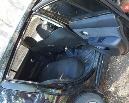 Чорний Ніссан Тііда, об'ємом двигуна 1.6 л та пробігом 53 тис. км за 8000 $, фото 3 на Automoto.ua