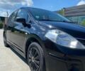 Чорний Ніссан Тііда, об'ємом двигуна 1.6 л та пробігом 305 тис. км за 5750 $, фото 1 на Automoto.ua