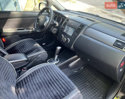 Черный Ниссан Тиида, объемом двигателя 1.6 л и пробегом 95 тыс. км за 10200 $, фото 5 на Automoto.ua